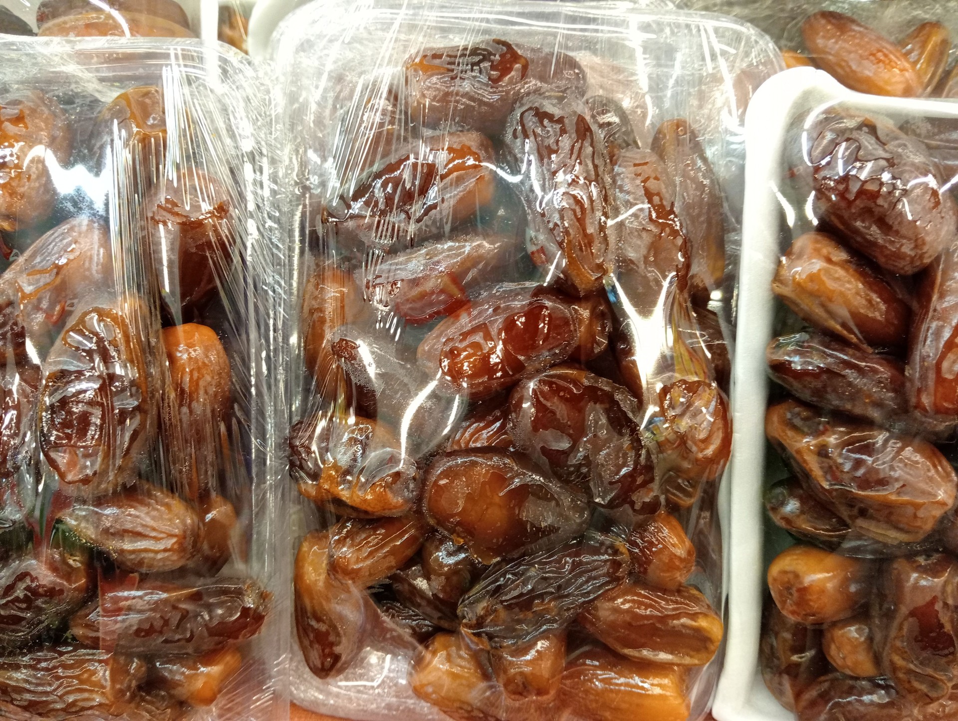 Neatly Packaged Dates in Styrofoam at Supermarket